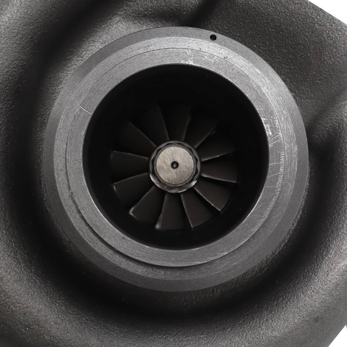 Turbocharger compressor wheel with dark blades and metal center hub