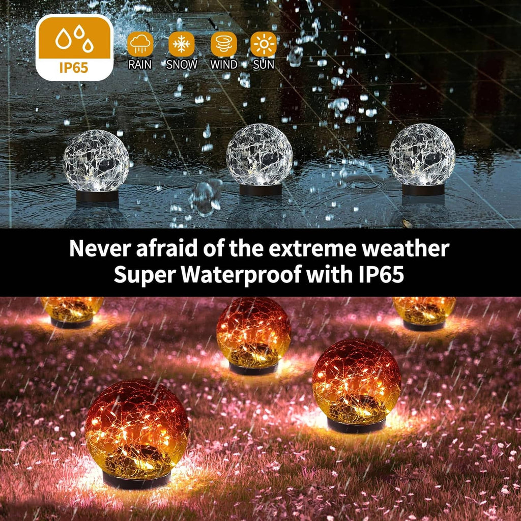 Outdoor solar globe lights with cracked-glass domes, warm glow on wet surface