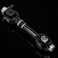 Rear prop drive shaft with black housing and silver U-joints, metal ends