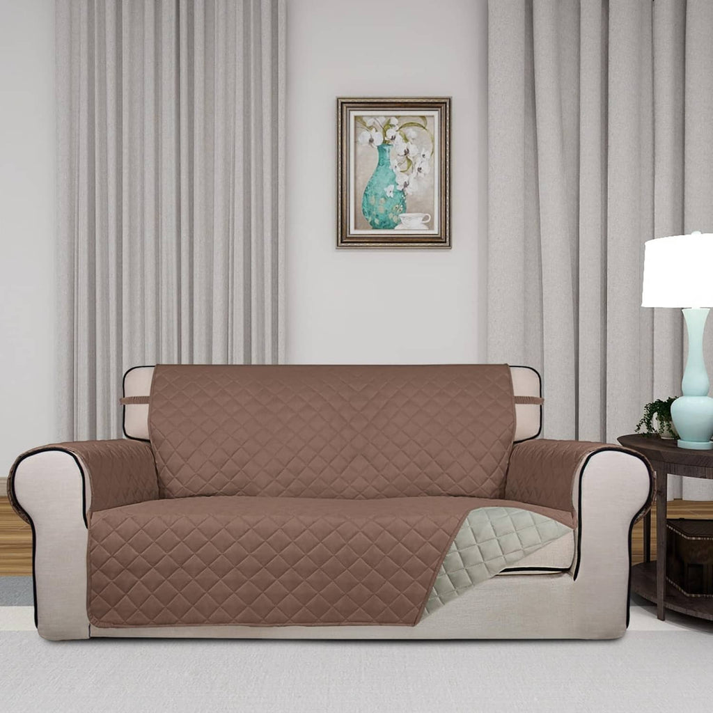 Reversible quilted loveseat sofa cover in brown with beige side panels and backing