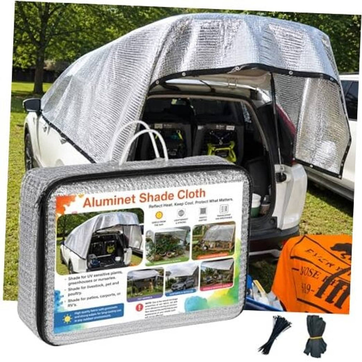 Silver reflective shade cloth cover draped over a vehicle, with reinforced edges