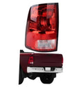 Left driver-side taillight with red lens and clear reverse light section, rear lamp