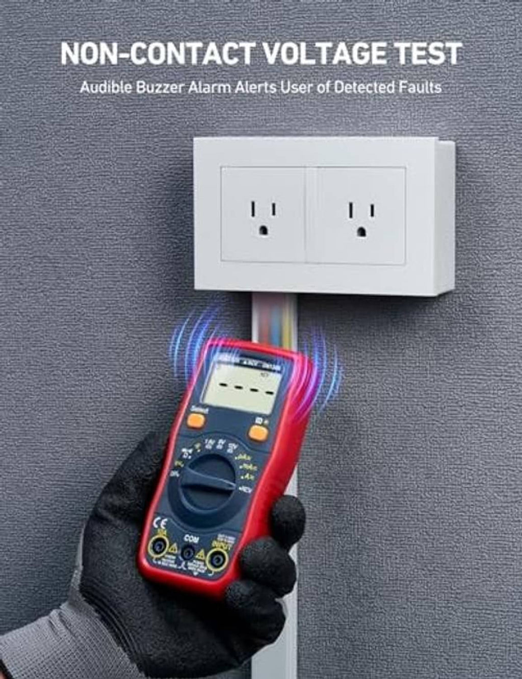 Digital non-contact voltage tester multimeter with red case near wall power outlet