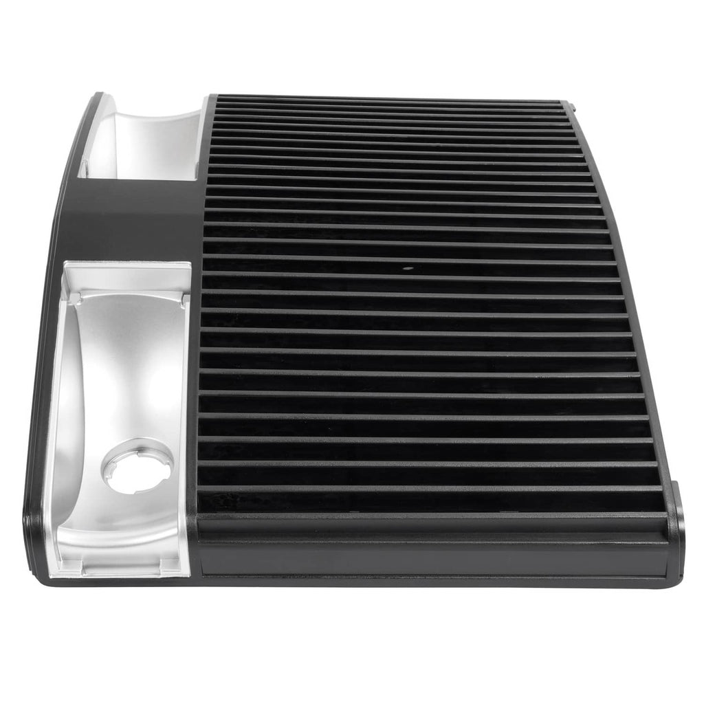 Tractor grille side view with black slat bars and silver end housing with round cutout