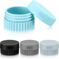 Light blue silicone travel cream jar set with ribbed lid and open container, stackable