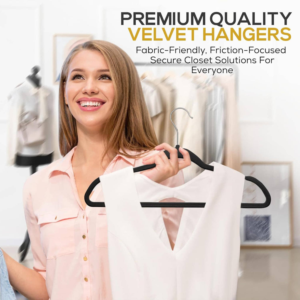 Black velvet non-slip hanger holding a white blouse, friction-focused closet solution