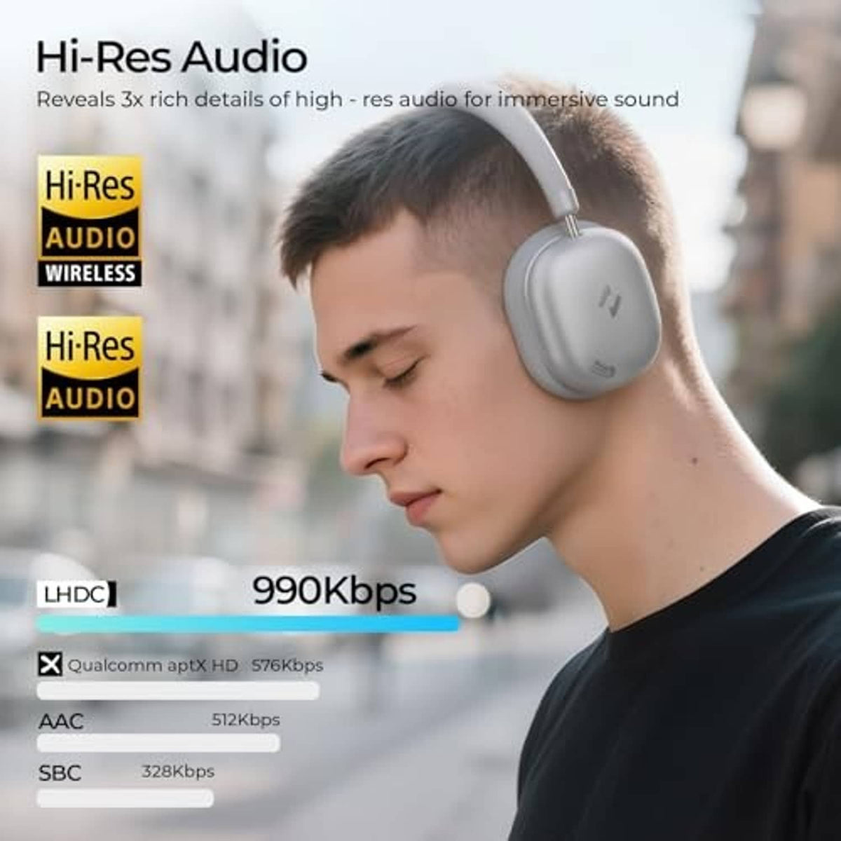 Silver over-ear wireless headphones on a person with comfortable cushioned earcups