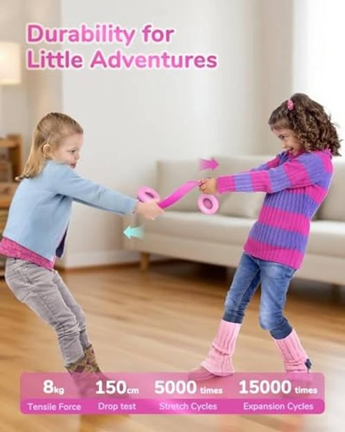 Rose pink kids headphones worn while children play, over-ear fit