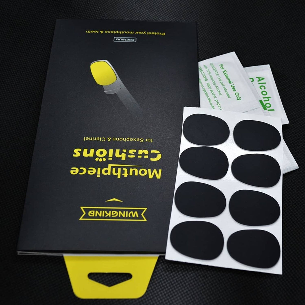 Mouthpiece cushion kit with dark box and black adhesive pads plus alcohol prep wipes