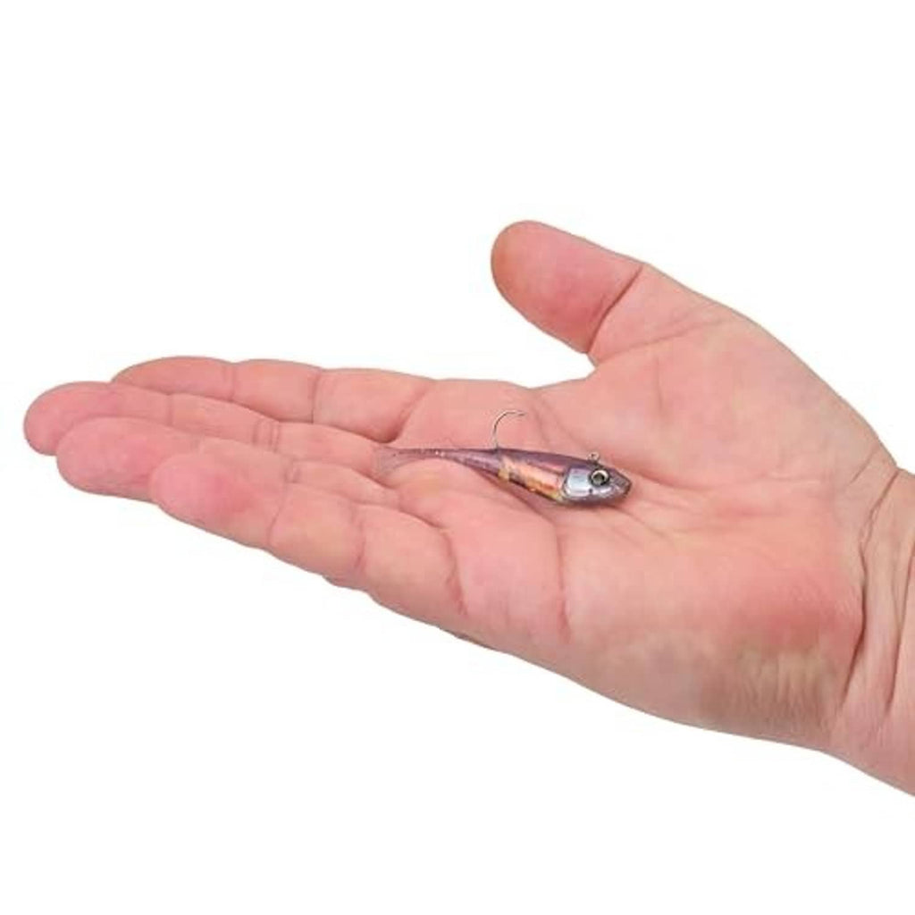 Purple fishing soft bait lure on an open hand, showing jig head and hook