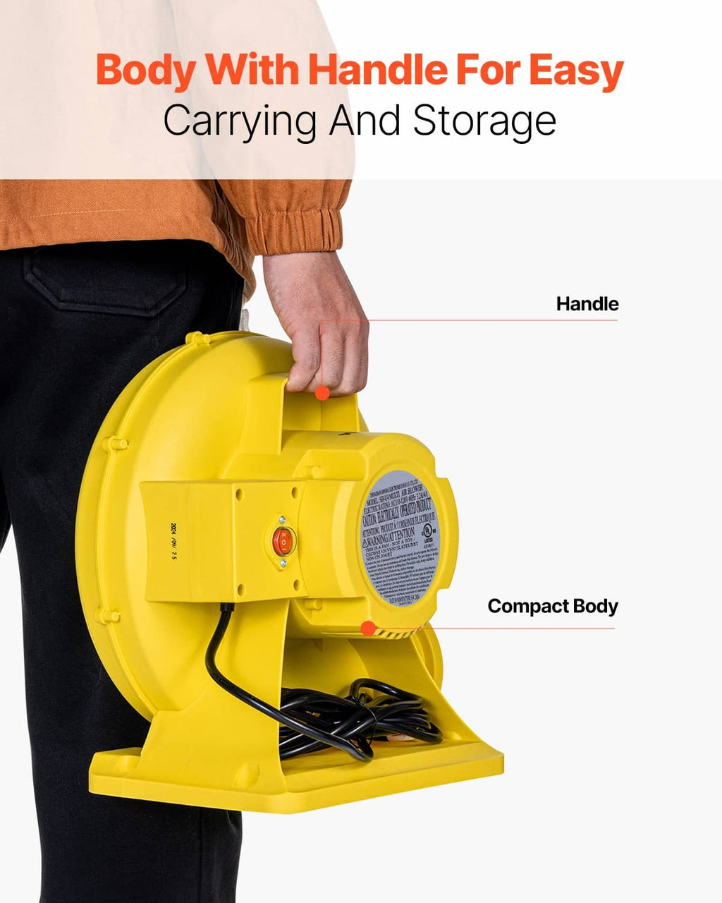Yellow blower with carry handle, compact housing, and front vent grille