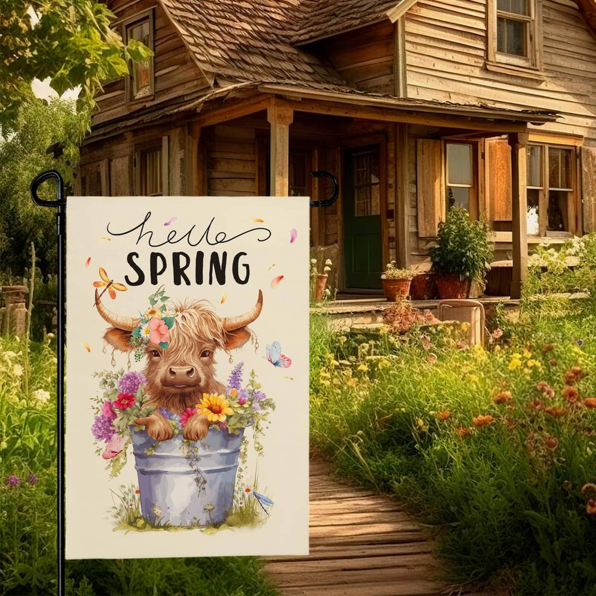 Hello Spring cream garden flag featuring a highland cow with flower bouquet and butterflies