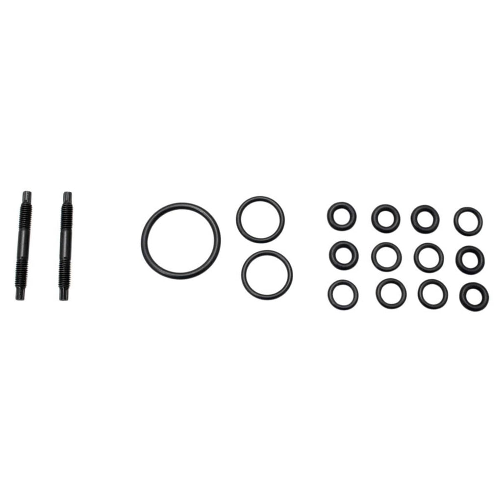 Intake manifold seal kit with O-rings, gaskets, and threaded studs.