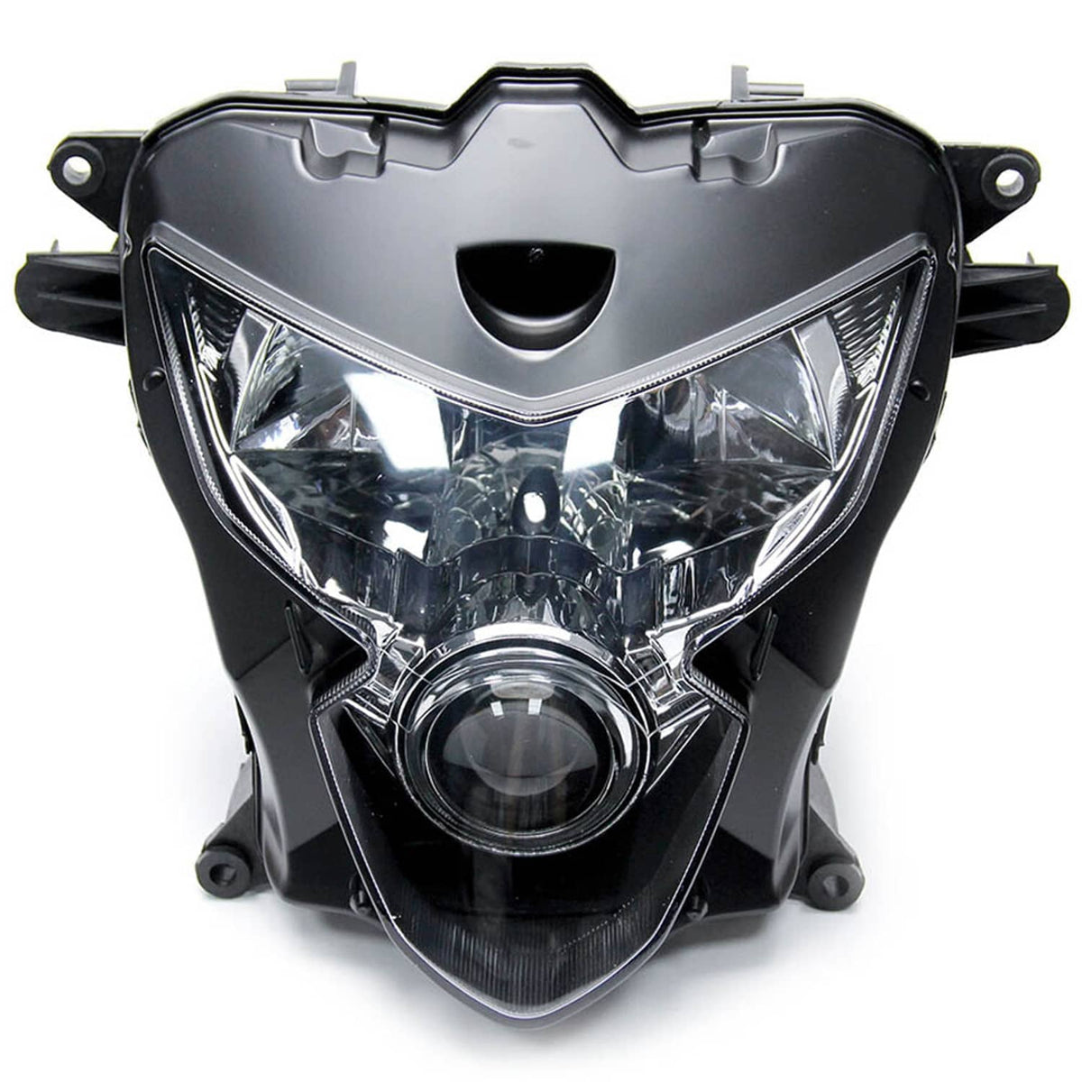 Motorcycle headlight assembly close-up, black housing with clear projector lens