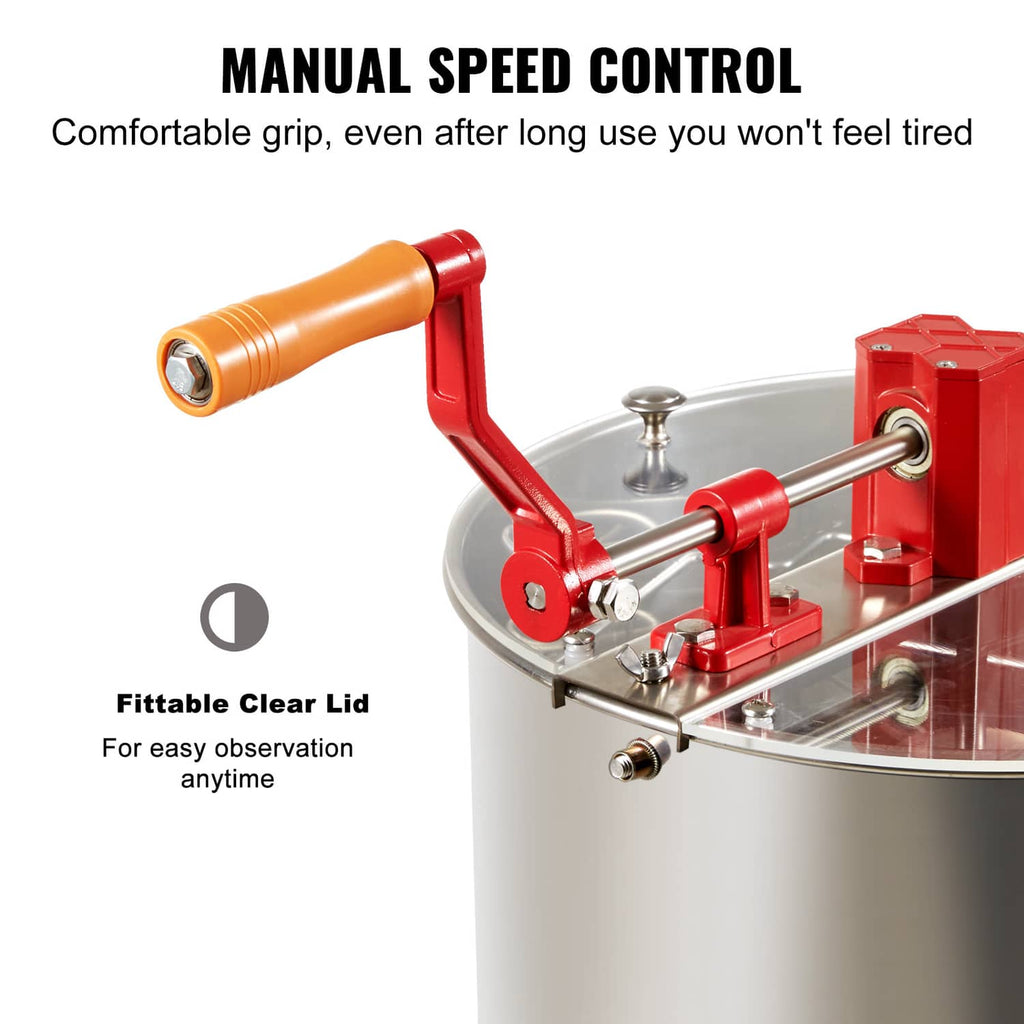 Manual speed control with red crank handle and clear lid on honey extractor