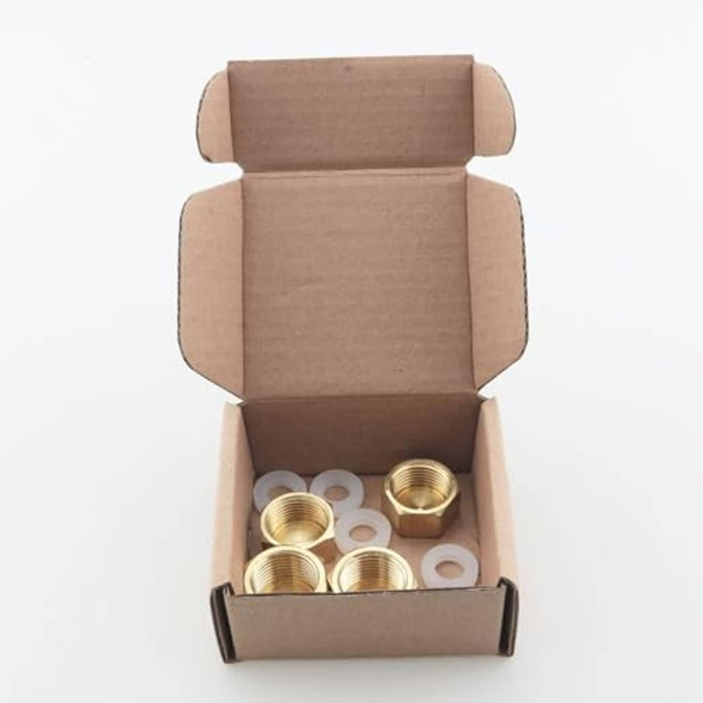 Brass hex pipe plug caps and rubber washers in shipping box, four-piece set