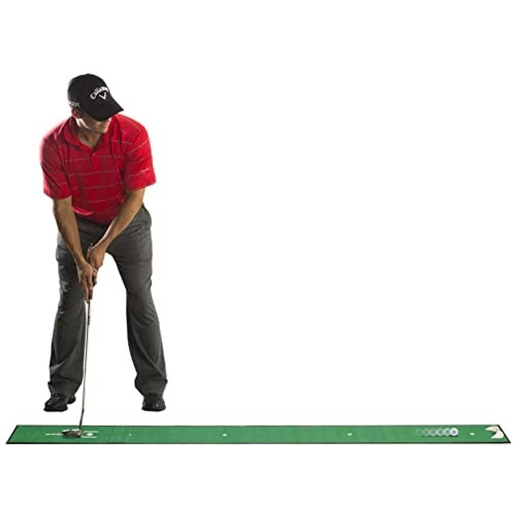 Green putting practice mat laid flat with center slot and marker dots