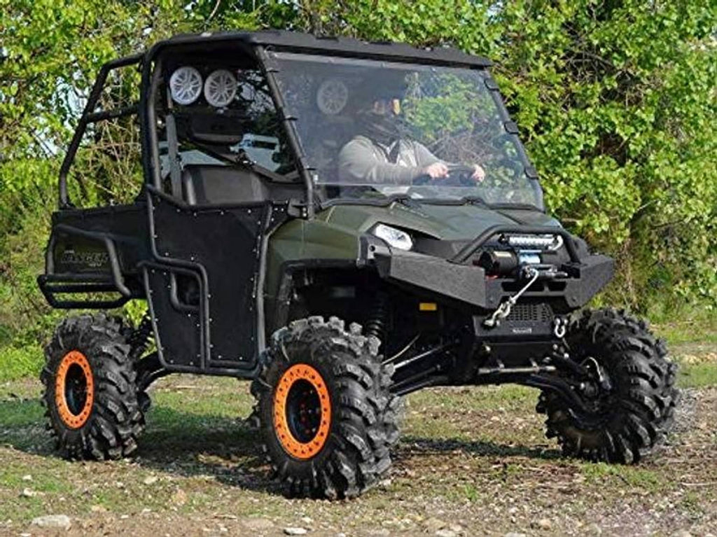 Clear full windshield on UTV with black surround and front accessories bracketry
