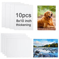Ten white 8x10 aluminum sublimation photo blanks, stacked for photo printing