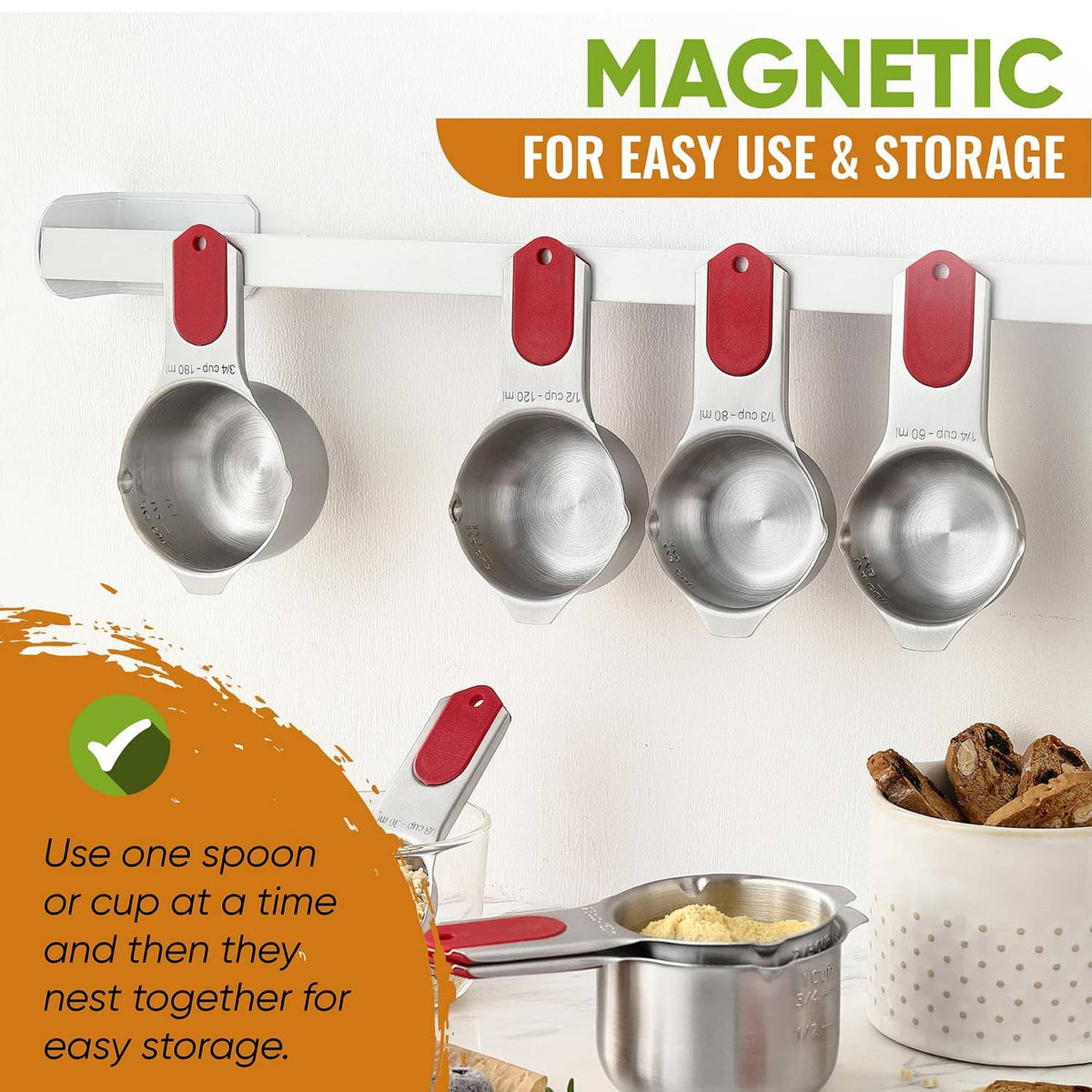 Magnetic measuring spoons hanging on a bar, stainless bowls with red tabs