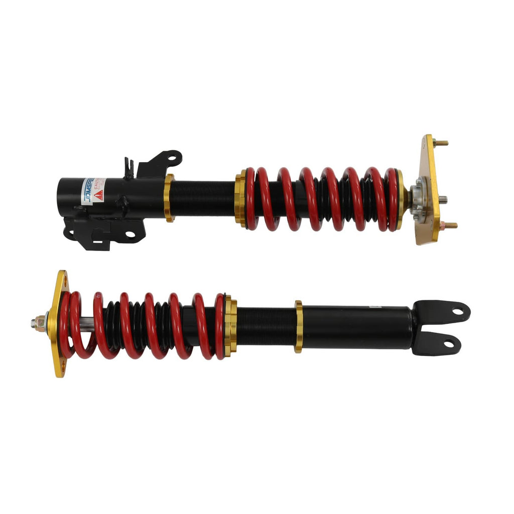 Pair of coilover shocks with red coil springs, black dampers, gold mounting plates