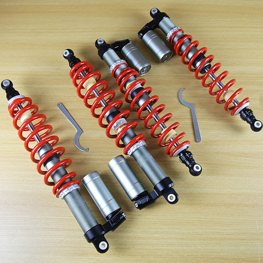 Air shock absorbers set with red coil springs, silver damper bodies, and bracket tools