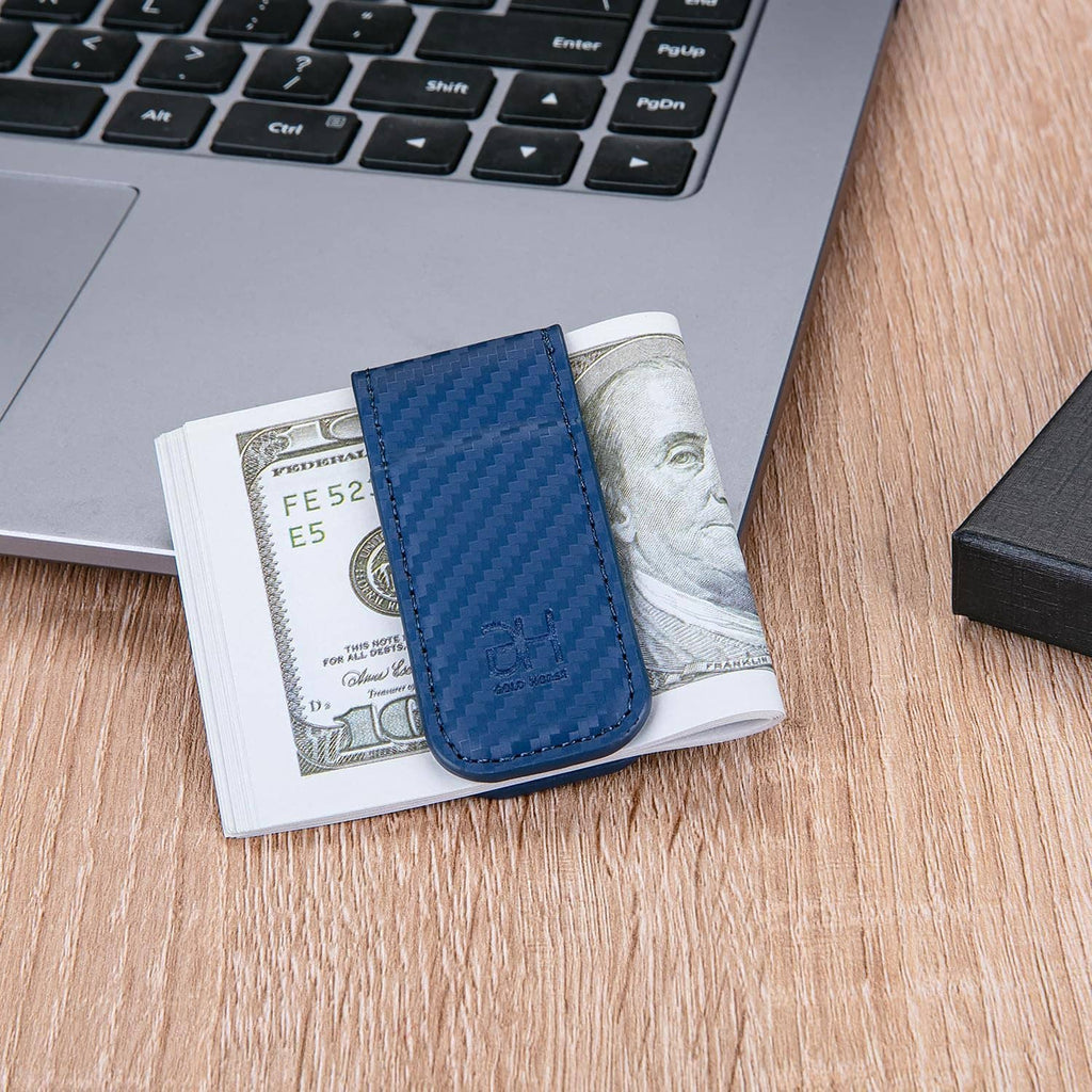 Blue leather card holder holding folded bills with magnetic closure