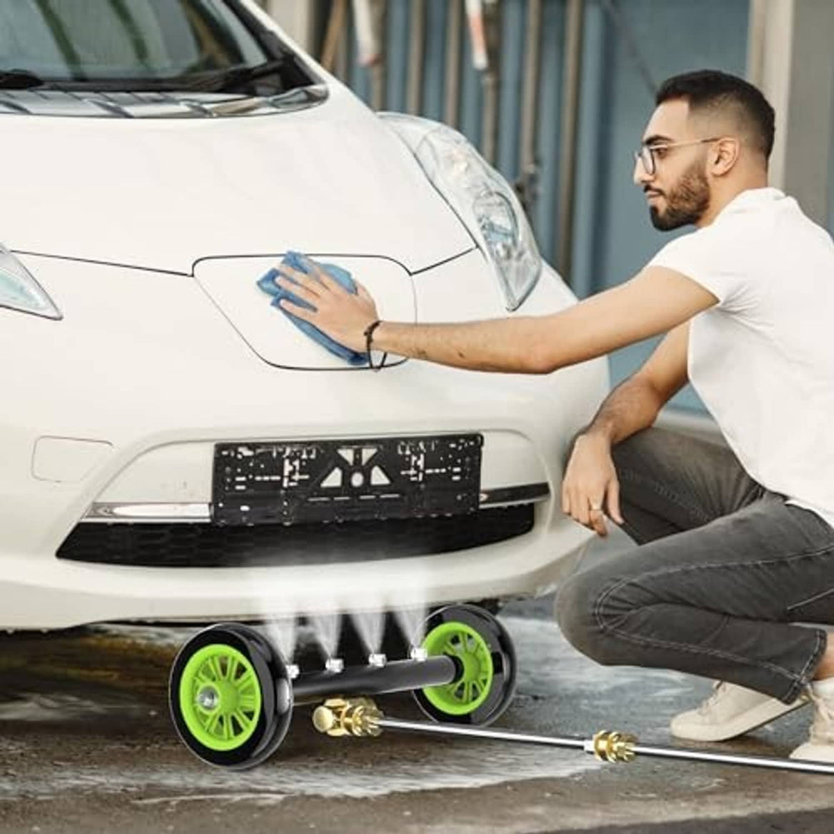 Undercarriage washer attachment with green wheels and brass fittings for power washing