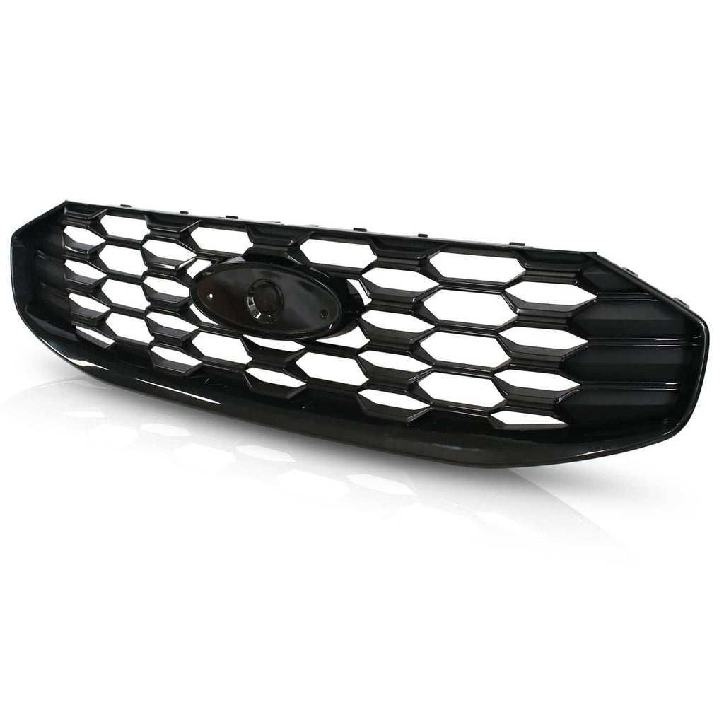 Black front grille insert with hex honeycomb pattern and center emblem opening