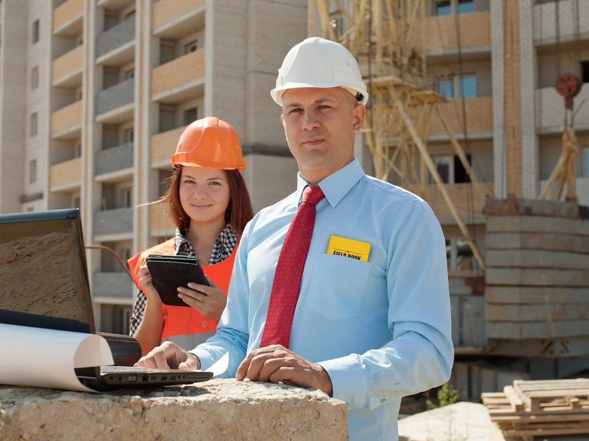 Pocket FIELD BOOK graph notebook held with black cover on site