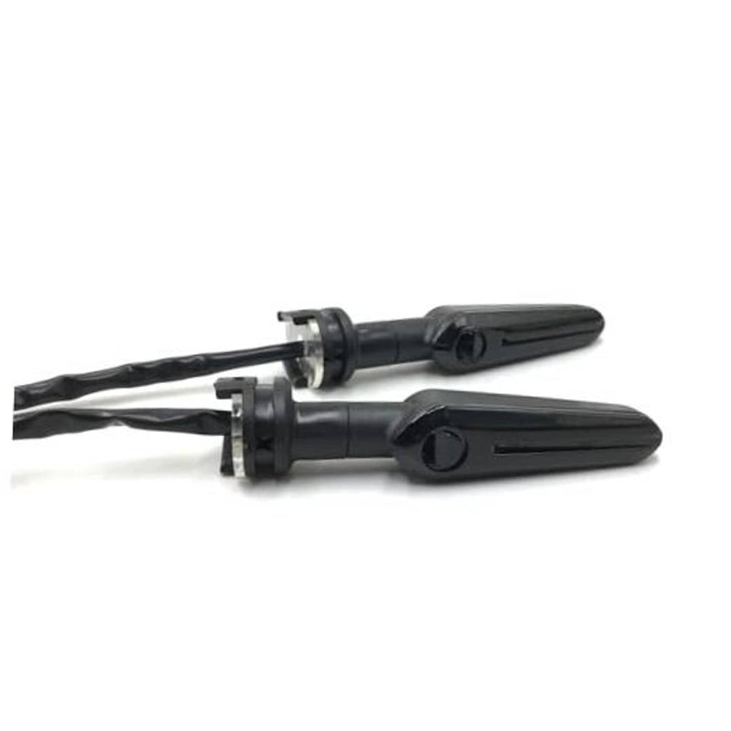 Black motorcycle LED turn signal pair with smoked arrow housings and wiring
