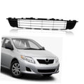 Front bumper lower grille with black mesh slats and center circular opening
