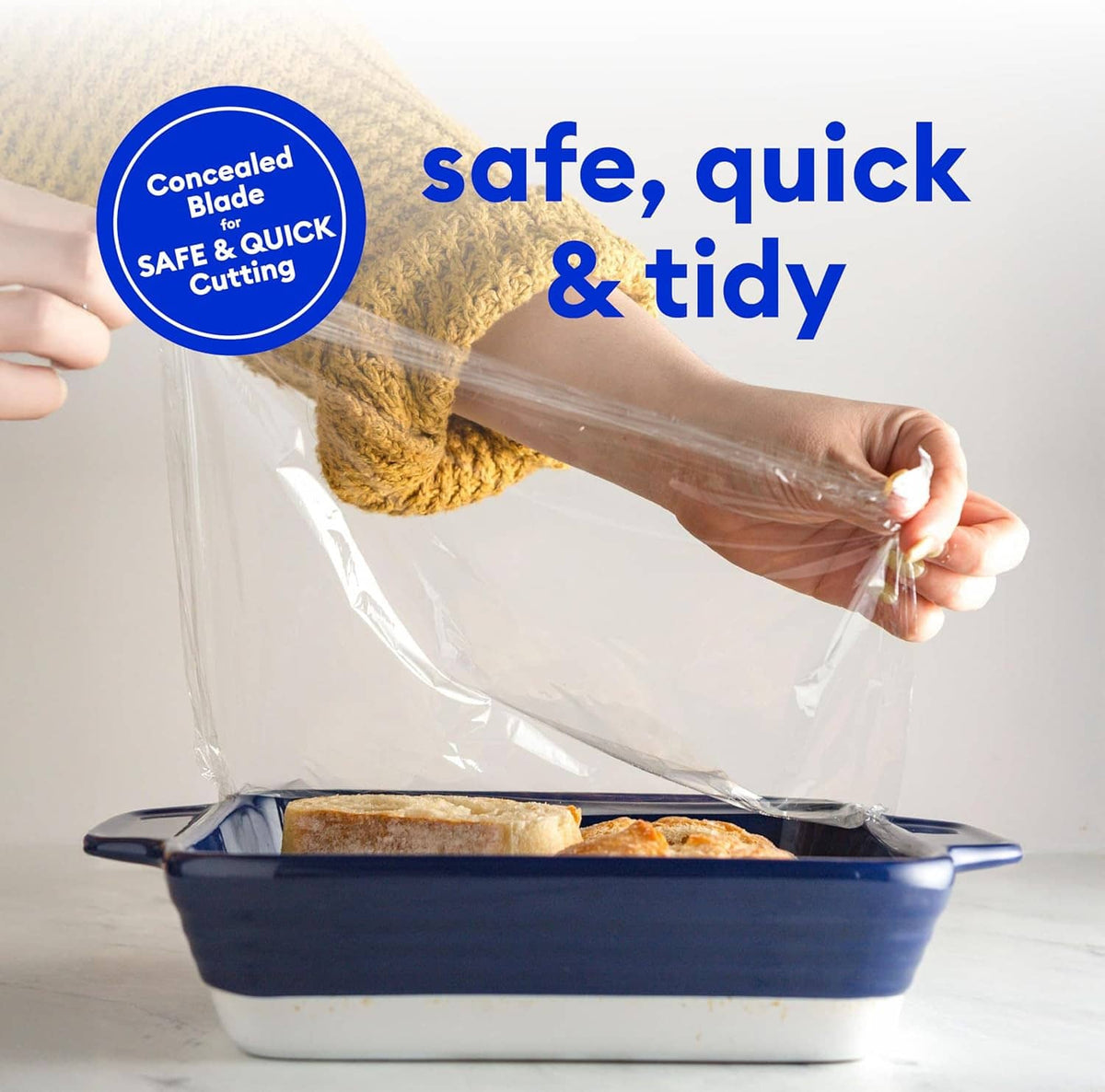 Plastic wrap being pulled from a clear roll over food in a baking dish