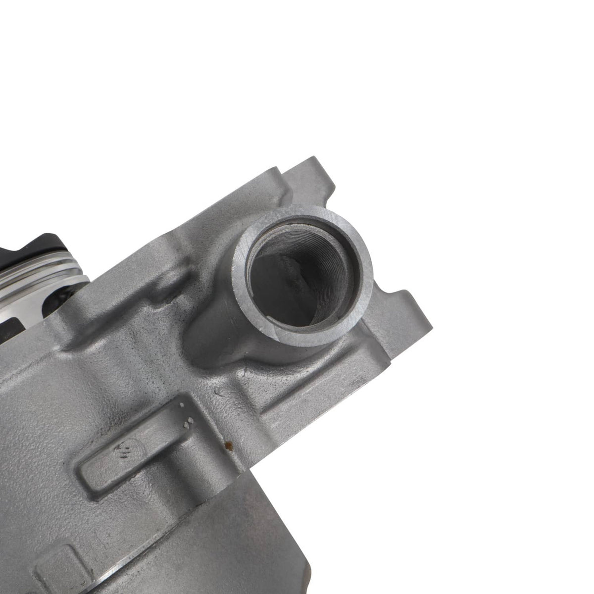 Machined cylinder housing with circular bore opening and mounting surface, metal finish