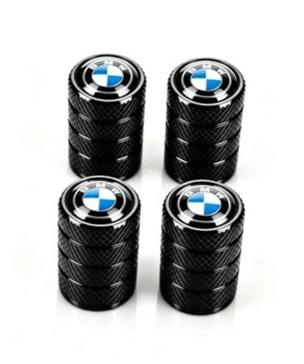 Set of four black tire valve stem caps with BMW blue-and-white logo centers