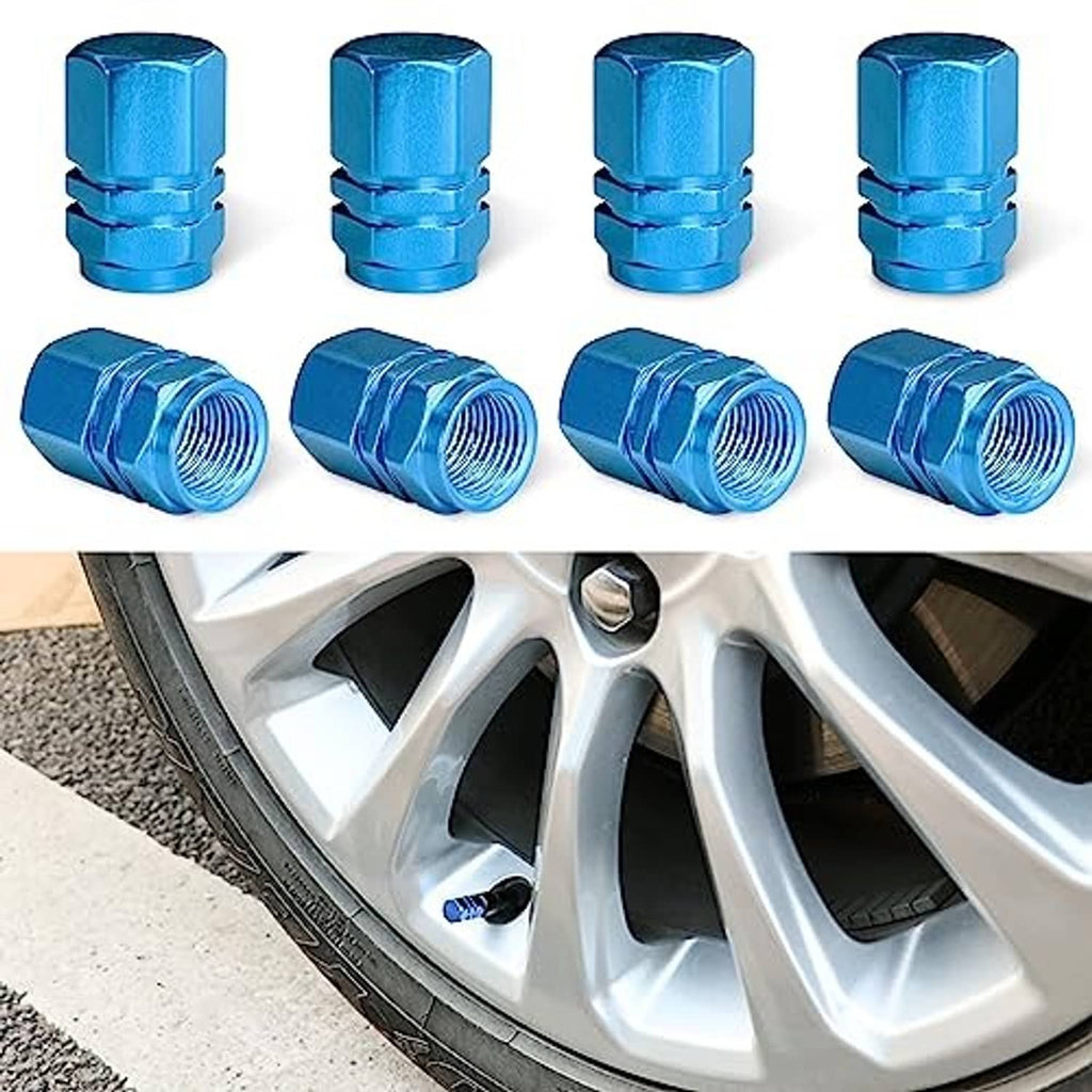 Light blue aluminum valve stem caps with hexagon tops on silver wheel