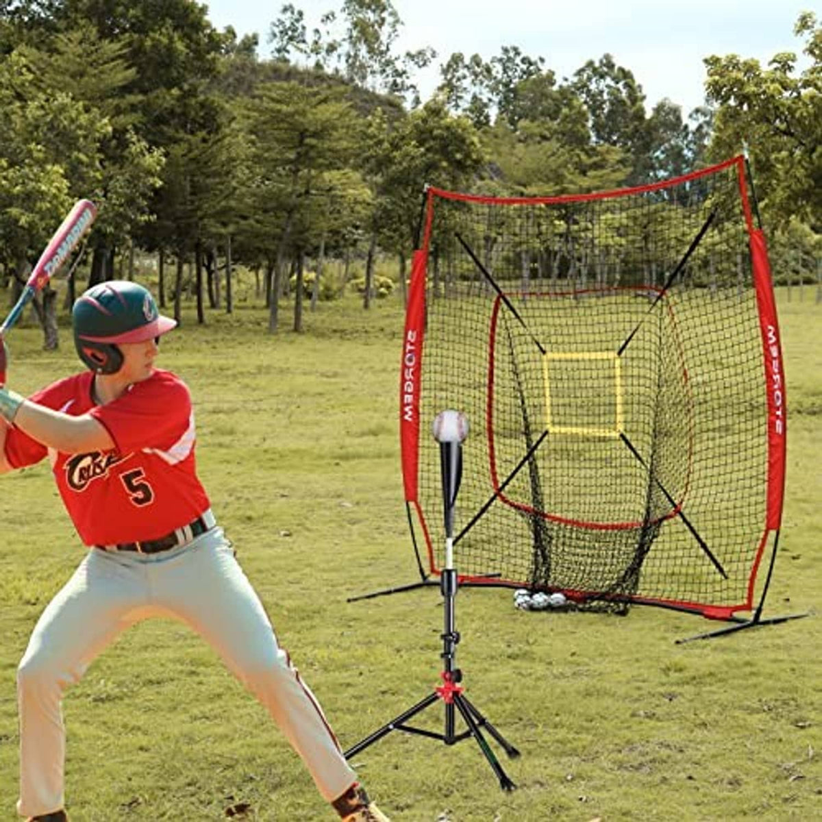 Red baseball practice net with yellow strike-zone target and tripod base outdoors