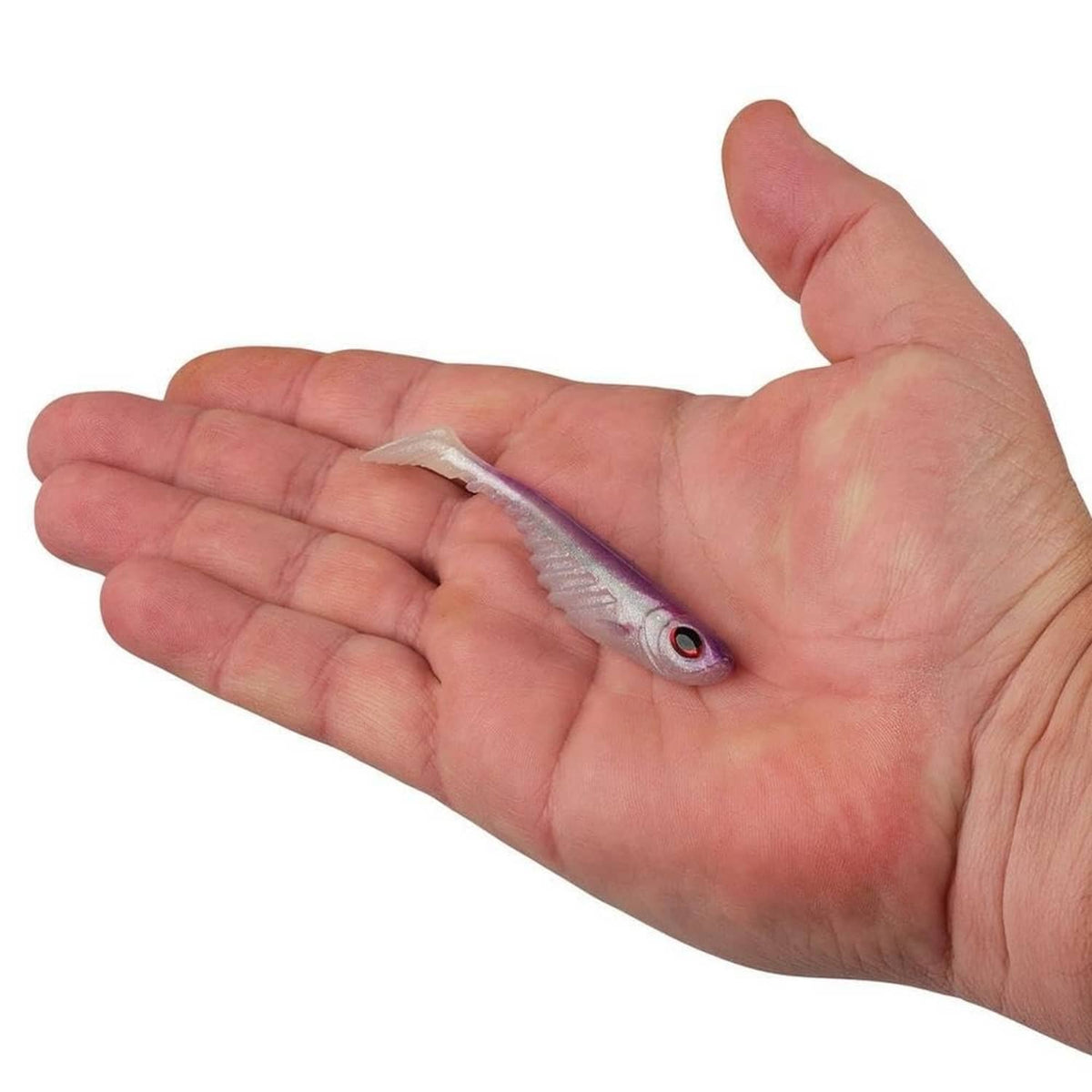 Berkley Powerbait purple smelt fishing lure held in palm, red eye visible