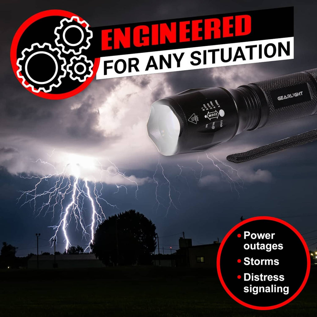 GearLight LED flashlight with wide front head, black body, lanyard strap attached