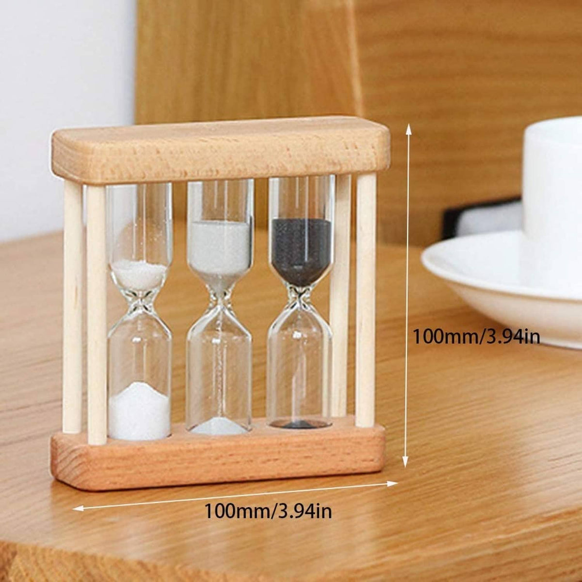 Wooden hourglass sand timer with three clear glass bulbs and white, gray, black sand