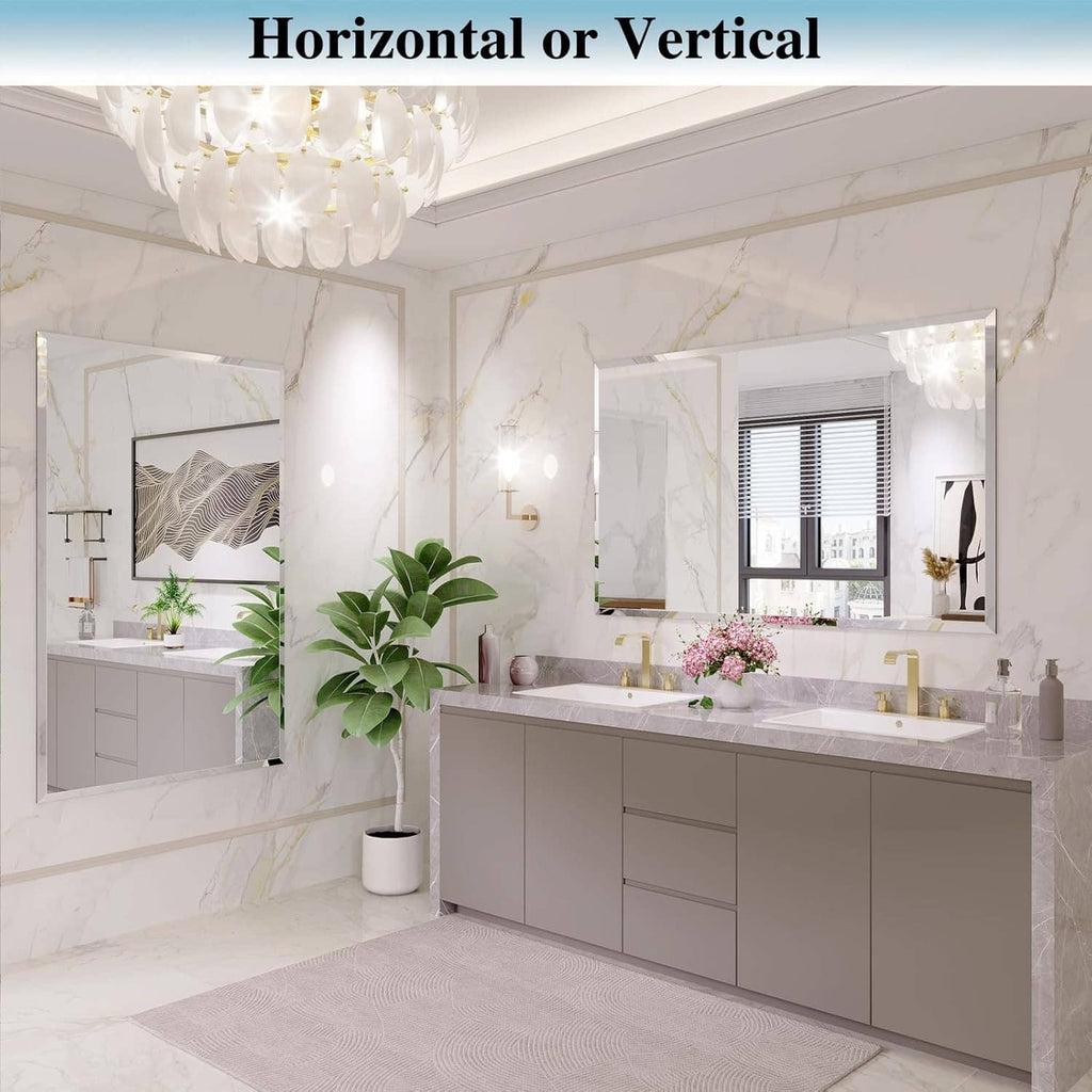 Frameless bathroom mirror with beveled edges above a light-colored double vanity