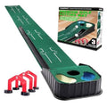 Indoor golf putting mat with green turf, white alignment guides, and goal cutouts