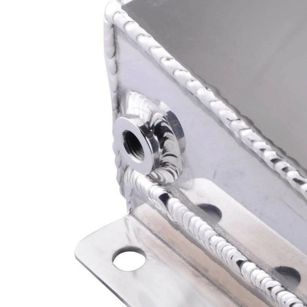 Aluminum reservoir outlet bracket and threaded port detail