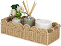 Beige scalloped woven toilet paper storage basket with a lidded roll holder