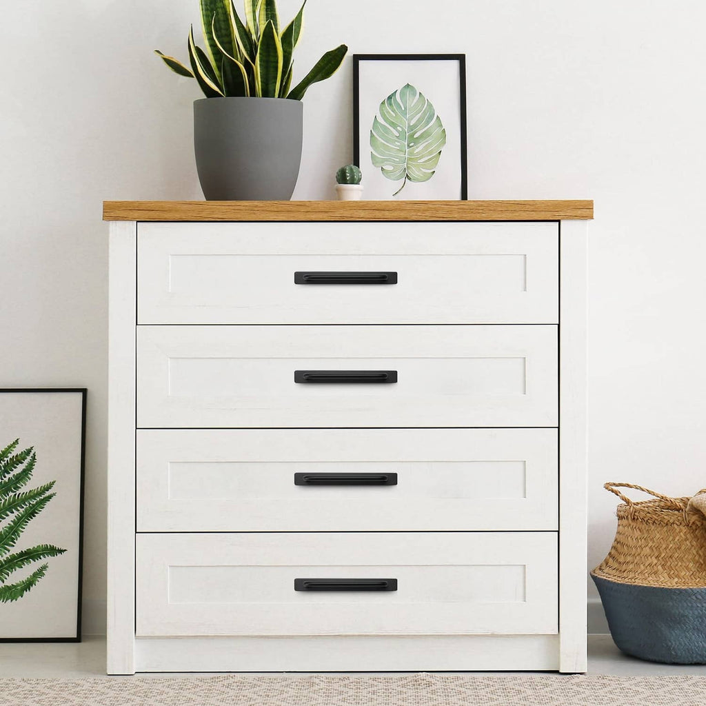 Black cabinet drawer handles on a white dresser with flat, rectangular pulls