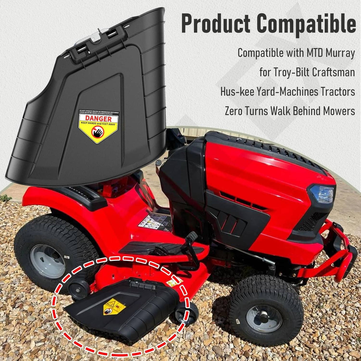 Black mower chute assembly with warning label and protective base