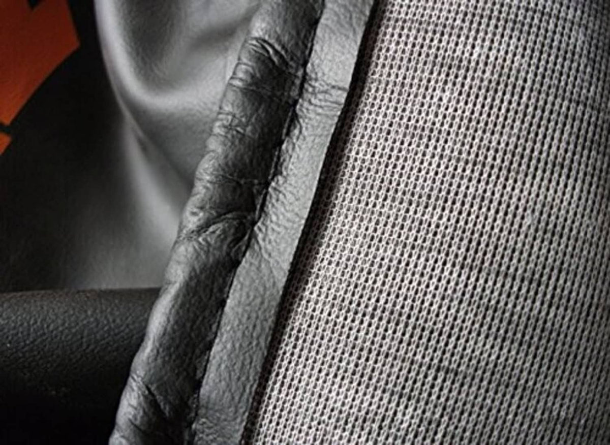 Universal spare tire cover material close-up with textured panel and stitched seam