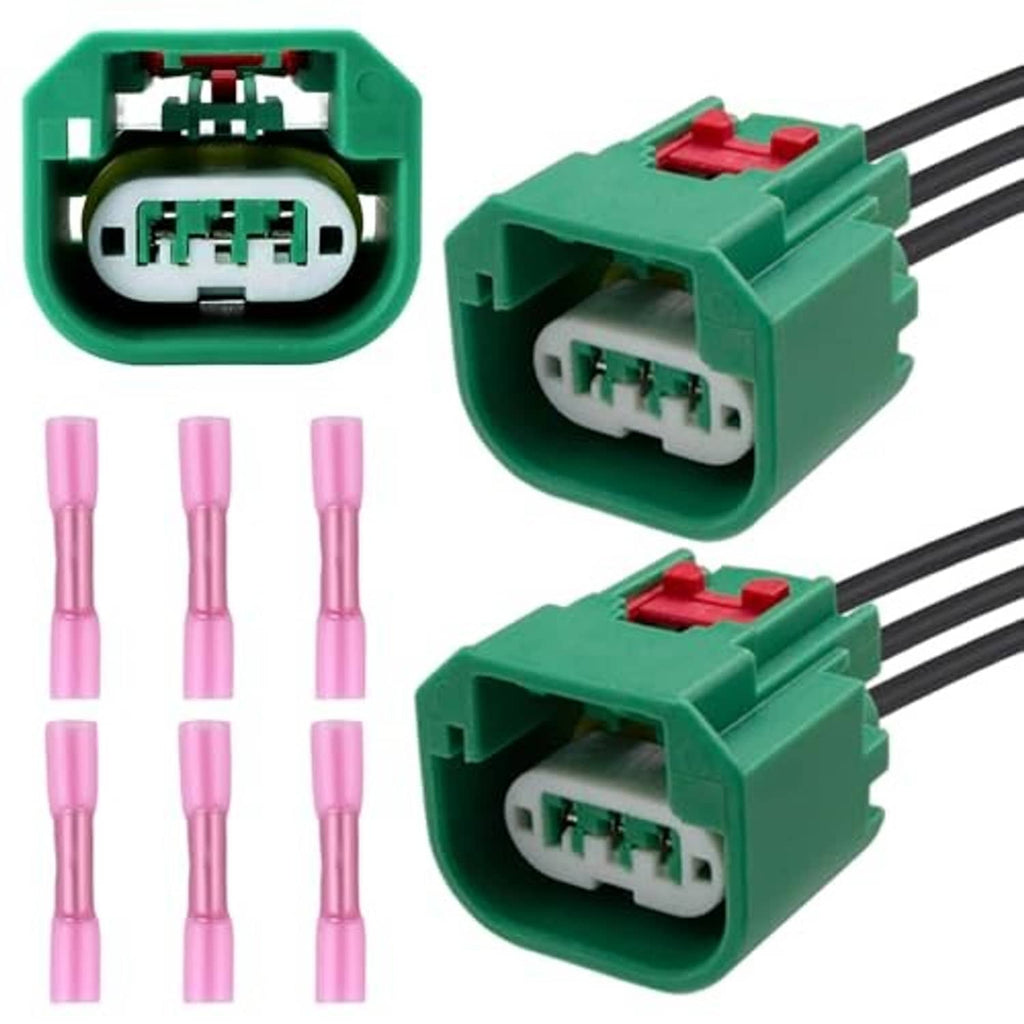 Headlight wiring harness connector pair, green plastic housings with red latches and black wires