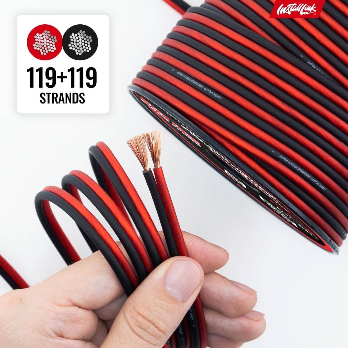 Hand holding bundled red-and-black 14 AWG speaker wire strands