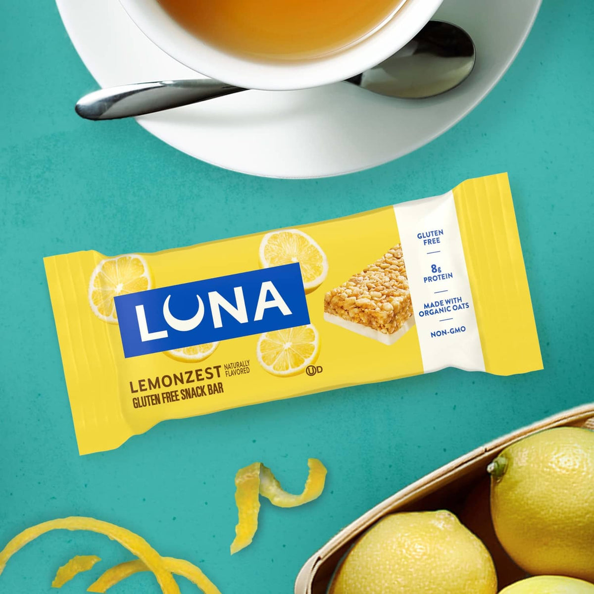 LUNA LemonZest gluten-free snack bar in yellow wrapper with lemon zest graphic